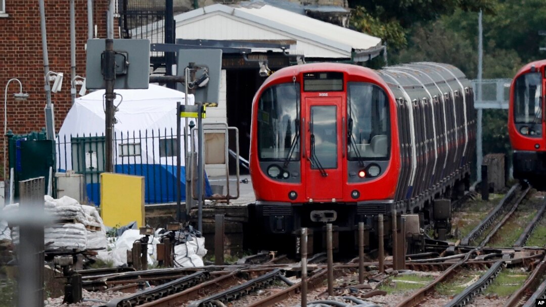 A police forensic tent stands on the platform next to the train on which a homemade bomb exploded at Parsons Green subway station in London, Sept. 15, 2017.