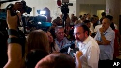 Mexican Foreign Minister Luis Videgaray, right, talks with journalists after the opening ceremony of the XXII Ordinary Meeting of the Council of Ministers of the the Association of Caribbean States at the Havana Libre Hotel in Havana, Cuba, March 10, 2017