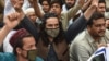 FILE - Activists of Pashtun Protection Movement (PTM) protest against the arrest of their activists and leaders, in Karachi, Feb. 10, 2019. 