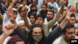 Activists of Pashtun Protection Movement (PTM) protest against the arrest of their activists and leaders, in Karachi on Feb. 10, 2019. 