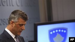 Kosovo Prime Minister Hashim Thaci makes his first public appearance since he was allegedly accused in Council of Europe investigator Dick Marty's report for organ trafficking in Pristina on Thursday, Dec. 16, 2010. Marty rocked Kosovo with his allegation