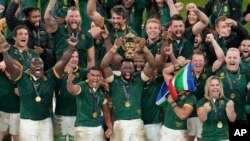 South Africa's captain Siya Kolisi holds the Web Ellis trophy after the Springboks beat New Zealand in the final of the 2023 Rugby World Cup at Stade de France in Saint-Denis, near Paris, Oct. 28, 2023. 