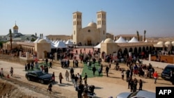 People arrive to attend Mass for the dedication and inauguration of the Church of the Baptism of the Lord at Al-Maghtas, Jordan, also known as Bethany Beyond the Jordan, on the eastern bank of the Jordan River on Jan. 10, 2025.