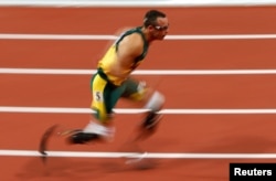 FILE - South Africa's Oscar Pistorius competes in a men's 400-meter semifinal during the London Olympic Games at the Olympic Stadium on Aug. 5, 2012.