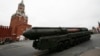 FILE - A nuclear-capable Russian Topol M intercontinental ballistic missile with launch vehicle rolls along Red Square during a military parade, in Moscow, Russia, May 9, 2017.