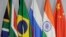 FILE — A general view of flags of (From L to R) South Africa, Brazil, Russia, India and China during the 2023 BRICS Summit at the Sandton Convention Center in Johannesburg on August 24, 2023.BRICS nations will discuss Gaza in a conference call on November 21, 2023.