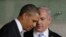 US President Barack Obama, left, listens to Israeli Prime Minister Benjamin Netanyahu during their visit to the Children's Memorial at the Yad Vashem Holocaust memorial in Jerusalem, March 22, 2013.