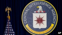 FILE - The seal of the Central Intelligence Agency is seen at CIA headquarters in Langley, Va.