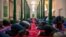 Uyghurs and other members of the faithful pray at the Id Kah Mosque in Kashgar in western China's Xinjiang Uyghur Autonomous Region, as seen during a government organized trip for foreign journalists, Monday, April 19, 2021. A human rights group is…
