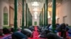 Uyghurs and other members of the faithful pray at the Id Kah Mosque in Kashgar in western China's Xinjiang Uyghur Autonomous Region, as seen during a government organized trip for foreign journalists, April 19, 2021.