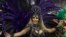 Transgender godmother Camila Prins, representing the Colorado do Bras samba school, performs at Carnival in the Sambadrome in Sao Paulo, Brazil, Feb. 22, 2020.