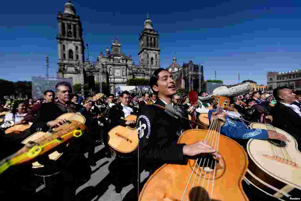 Hundreds of mariachis perform simultaneously traditional Mexican songs "Cielito Lindo" and "El son de la negra" at the Zocalo square in Mexico City, Mexico, Nov. 10, 2024.