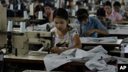 Workers at a garment in Burma.