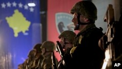 Soldiers of the Kosovo Security Force line up at the end of a formation ceremony in Pristina, Dec. 14, 2018. Kosovo's parliament convened Friday to approve the formation of an army.