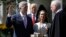 President Donald Trump watches as Supreme Court Justice Anthony Kennedy administers the judicial oath to Judge Neil Gorsuch during a re-enactment in the Rose Garden of the White House White House in Washington, April 10, 2017. 
