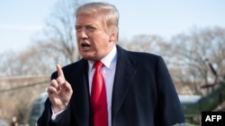 FILE - U.S. President Donald Trump speaks to the media prior to departing on Marine One from the South Lawn of the White House in Washington, March 28, 2019.