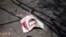 A ripped poster of Egypt's ousted President Mohamed Morsi lies on the ground in the courtyard of the Rabaah Al-Adawiya mosque in Nasr city, Cairo, August 21, 2013. 
