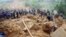 Rescuers search for victims after a landslide, triggered by sustained rains, buried a school and three farmhouses in Yiliang, southwest China's Yunnan province, October 4, 2012.