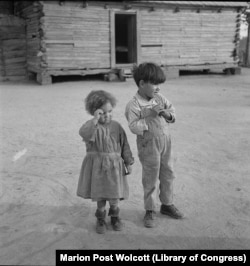 This 1938 Farm Security Administration photograph taken in Robeson County, N.C., is labeled "Indian children (mixed breed) near Maxton, North Carolina."