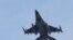 FILE - A Turkish war plane is seen in the sky.