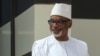 FILE - Mali President Ibrahim Boubacar Keita poses for a group picture during the G5 Sahel summit in Nouakchott, June 30, 2020.