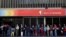 People line up to withdraw cash from a Banco de Venezuela branch in Caracas, Dec. 2, 2016. Venezuela's struggling economy took another hit on Friday when it's association with Mercosur was suspended.