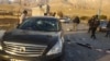 This photo released by the semi-official Fars News Agency shows the scene where Mohsen Fakhrizadeh was killed in Absard, Iran, Nov. 27, 2020.