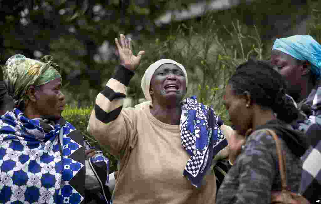 Mary Italo, center, grieves with other relatives for her son Thomas Abayo Italo, 33, who was killed in the Westgate Mall attack, as they wait to receive his body at the mortuary in Nairobi, Kenya, Sept. 25, 2013.&nbsp;