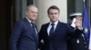 French President Emmanuel Macron welcomes Poland's Prime Minister Donald Tusk before an informal summit of European leaders to discuss the situation in Ukraine and European security at The Elysee Presidential Palace in Paris on Feb. 17, 2025.