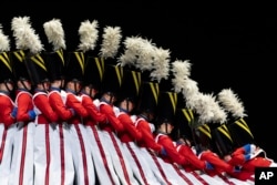 Radio City Rockettes perform the Parade of the Wooden Soldiers dance during the Christmas Spectacular at Radio City Music Hall, Friday, Dec. 13, 2024, in New York. (AP Photo/Julia Demaree Nikhinson)