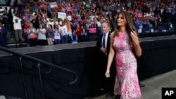 First lady Melania Trump walks from the stage after introducing her husband, President Donald Trump, at a rally at the Covelli Centre in Youngstown, Ohio, July 25, 2017.