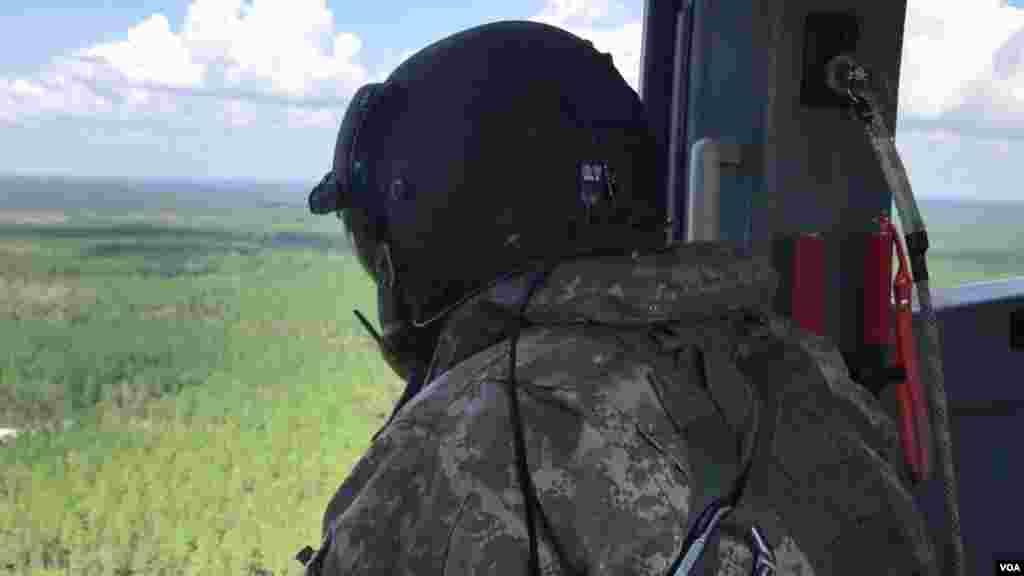 Photography by VOA's Celia Mendoza. Helicopter flight - courtesy Texas Army National Guard.