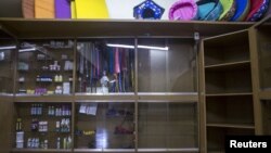 Shelves which would usually contain food for cats and dogs and others supplies sit almost empty in Caracas, Venezuela, Sept. 22, 2015.