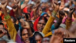 FILE - Women rally in New Delhi, India, Dec. 15, 2011. 