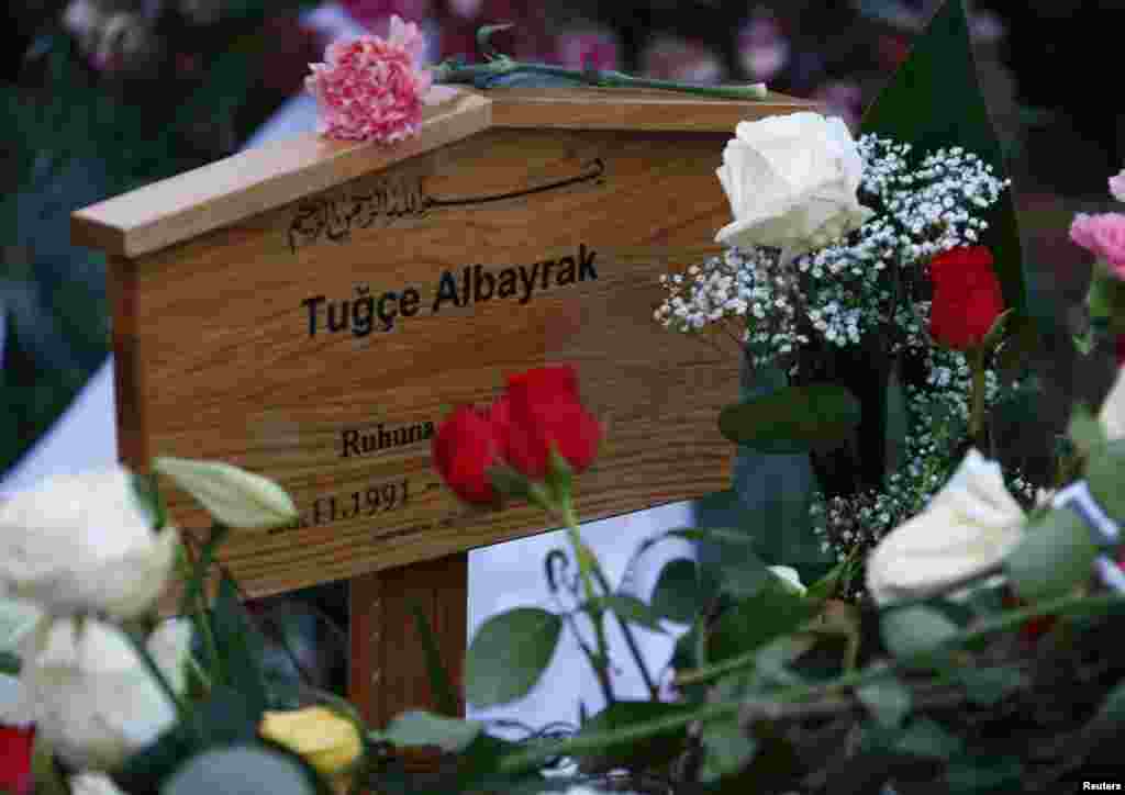 Tugce Albayrak&#39;s grave is seen covered with flowers at a cemetery in Bad Soden-Salmuenster, Dec. 3, 2014.