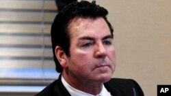 FILE - Papa John's founder John Schnatter attends a meeting in Louisville, Ky., Oct. 18, 2017.