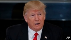 President Donald Trump speaks in the State Dining Room of the White House in Washington, Feb. 3, 2017. 