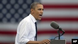 Presiden Barack Obama memberikan pidato dalam kampanye di Universitas Iowa, di Iowa City, negara bagian Iowa, Jumat (7/9). 