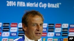 United States' head coach Jurgen Klinsmann speaks during a press conference the day before the World Cup round of 16 soccer match between Belgium and the U.S. at Arena Fonte Nova in Salvador, Brazil, June 30, 2014. 