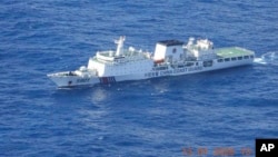 A Chinese coast guard ship moves through seas within the Philippines' Exclusive Economic Zone on Jan. 13, 2025. (Philippine Coast Guard via AP)