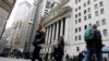Wall Street abre en alza, disminuye el desempleo