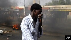 A sign is displayed by pro-democracy protesters on a vehicle bridge in the Central financial district in Hong Kong, Nov. 6, 2014.
