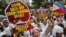 Filipinos chant anti-China slogans as they march towards the Chinese consulate in Manila's Makati financial district May 11, 2012. 