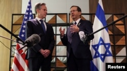 (FILE) U.S. Secretary of State Antony Blinken meets with Israel's President Isaac Herzog, in Tel Aviv, Israel, August 19, 2024.