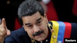 Presiden Venezuela Nicolas Maduro tiba untuk menghadiri rapat Dewan Konstituante di Caracas, Venezuela (10/8) lalu. 