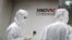 People work in a laboratory of Chinese vaccine maker Sinovac Biotech, developing an experimental COVID-19 vaccine, during a government-organized media tour in Beijing, China, Sep. 24, 2020.