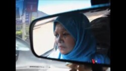 看天下: 埃及出现女出租车司机