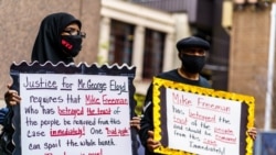 Protesters gather outside the Public Safety Facility building before former Minneapolis police officer Derek Chauvin will be charged in the death of Floyd George, in Minneapolis, Minnesota, June 29, 2020.