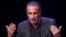 FILE - Prominent Islamic scholar Tariq Ramadan delivers a speech at a French Muslim organization's meeting in Lille, northern France, Feb. 7, 2016.