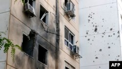 Здание в Ашкелоне, Израиль, поврежденное в результате обстрела с территории Сектора Газы